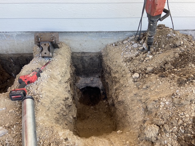 house foundation excavation and push-pier work (image 2)