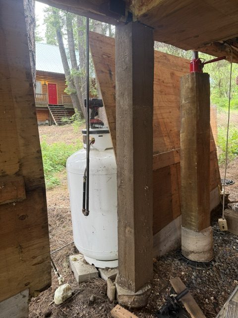 house crawl-space supports and adjacent deck (image 10)