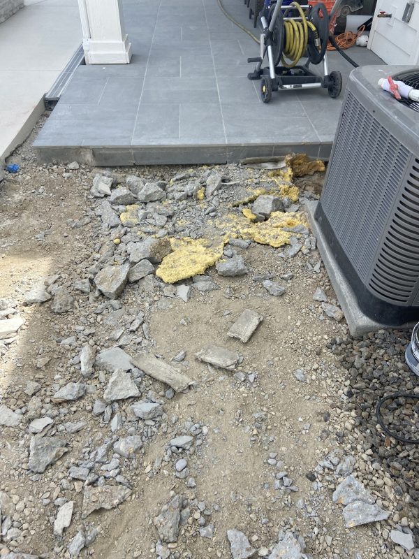 pump-house slab edge and exposed voided subbase (image 1)
