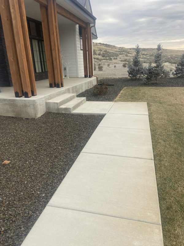 new home's heavy front porch and adjacent concrete (image 4)