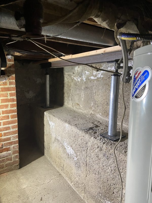 crawl-space stem-wall and support-post repair area (image 2)