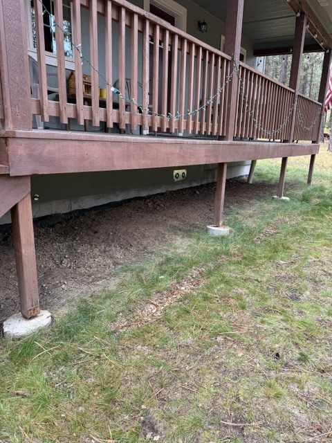 house crawl-space supports and adjacent deck (image 7)