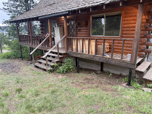 house crawl-space supports and adjacent deck (image 6)