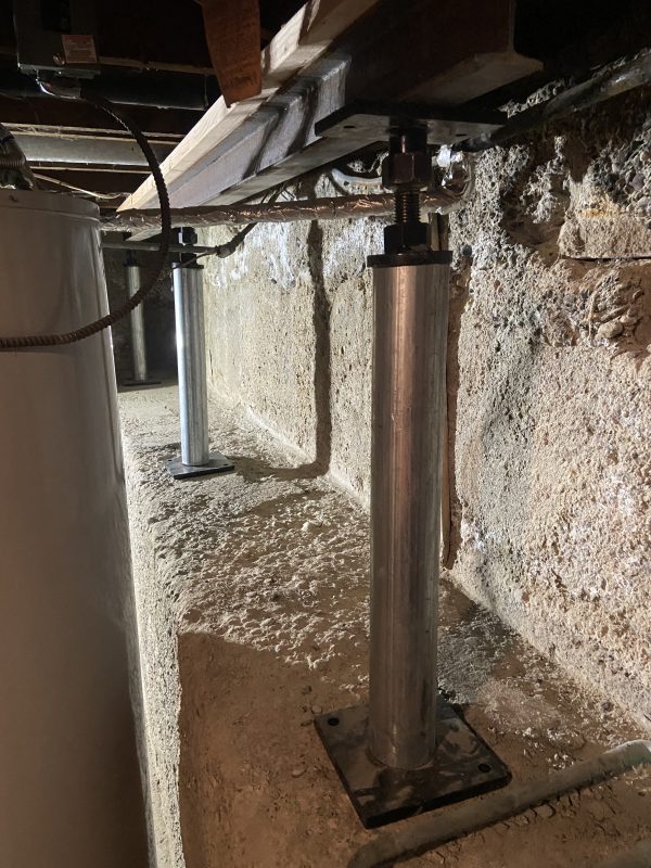 crawl-space stem-wall and support-post repair area (image 1)